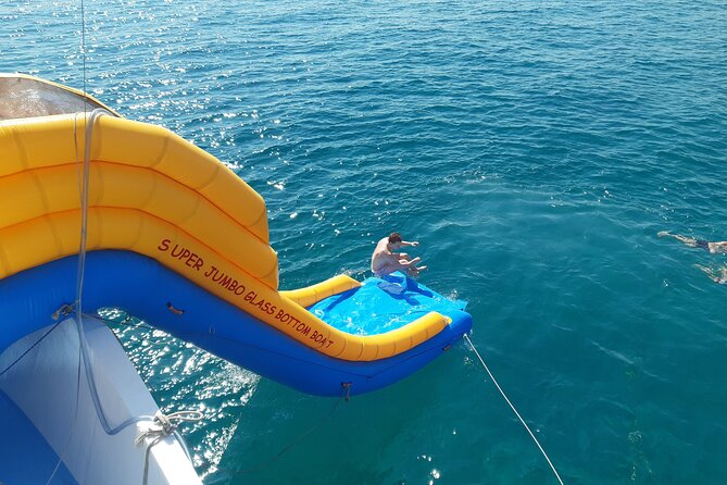 2.5 hour Glass Bottom Boat Trip, Snorkeling, Sliding and Fun - The Shipwreck-And-Slide Combo You Actually Feel