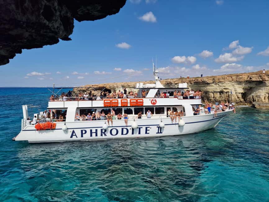 Ayia Napa: Lazy Day Cruise, Turtle Cove, Blue Lagoon & Lunch - The coastline drive-by tour: Sea Caves, Cape Greco, and Protaras history views