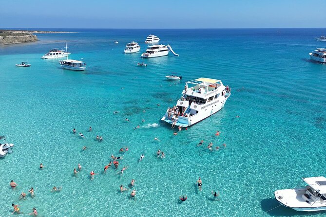 Blue Lagoon Akamas Bus and Boat Tour with Water Slide from Paphos - Sea Caves: Short, Scenic, and Great for First Photos