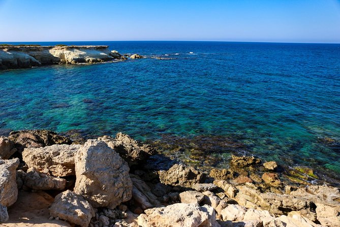 Blue Lagoon and Aphrodite’s Birthplace Day Tour from Limassol - Latsi Beach: the calm fishing village break before the lagoon