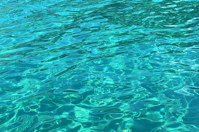 Blue Lagoon cruise: giant slide, music & Paphos hotel transfers - Coach transfer reality: long days, heat, and how to handle it