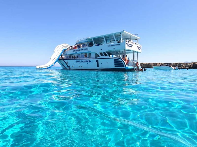 Blue Lagoon Cruise: Waterslide Adventure from Latchi Harbour - Onboard treats, Wi-Fi, and the bar reality