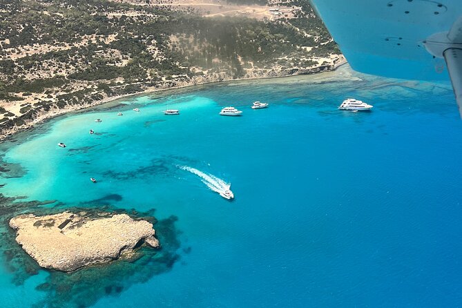 Blue Lagoon Latchi Pafos, boat trip with water slide F/D - The Blue Lagoon cruise with slide: your best hour of the day