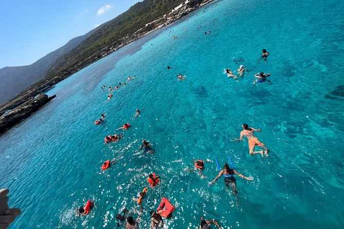 Blue Lagoon trip with slide & music departing from Latchi harbour - Drinks, fruit, wifi, and the reality of onboard music