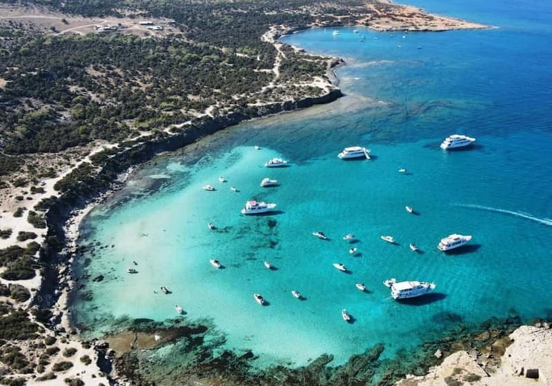 FROM LATCHI: Blue Lagoon Akamas Cruise - large water slide - The Blue Lagoon Anchor Stop and Your Swim Window