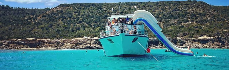 FROM LATCHI: Blue Lagoon Akamas Cruise - large water slide - Tips to Get the Most From Your Blue Lagoon Swim