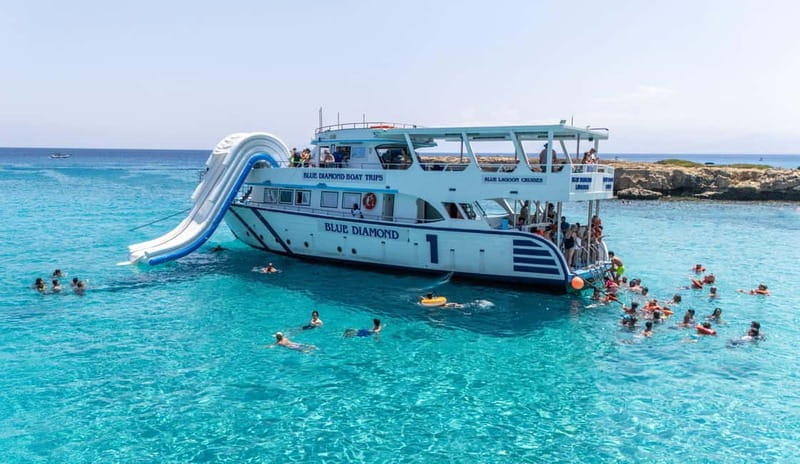 FROM LATCHI: Blue Lagoon Akamas Cruise - large water slide - Riding the Blue Diamond Past Baths of Aphrodite
