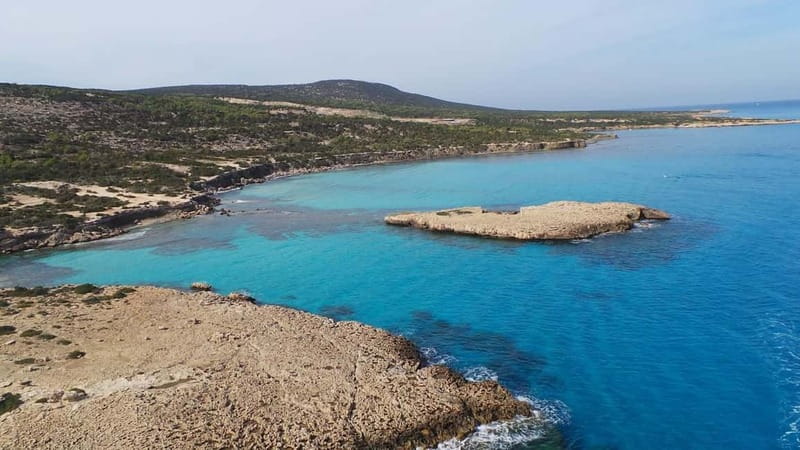 From Latchi: Blue Lagoon Tour via Karnic SL800 Boat - A luxury yacht charter vibe, but still practical