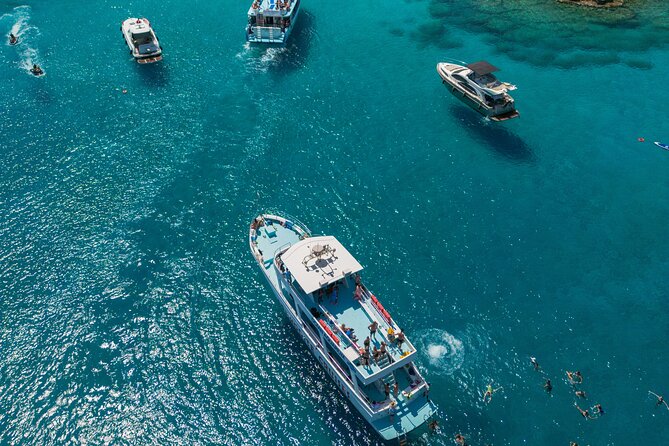 From Protaras: Turtle Cove & Blue Lagoon Cruise - On-board comfort: restrooms, Wi-Fi, shade, and what to buy