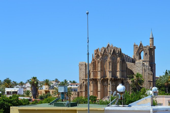 Ghost-Town Famagusta Mini Bus Tour from Protaras and Ayia Napa - Walking the ghost-town streets: abandoned hotels to the Golden sand shore