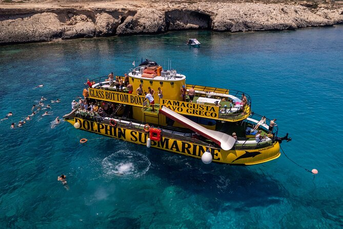 Glass Bottom Boat Dolphin Cruise to Blue Lagoon and Turtle Cove - Cape Greco sea caves: the photo stop with shoes for a reason