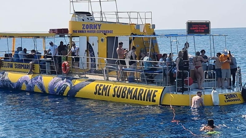 Larnaca: Yellow Submarine Mini Cruise with a Swim Stop - Cruising back along Finikoudes beach with shade and comfort