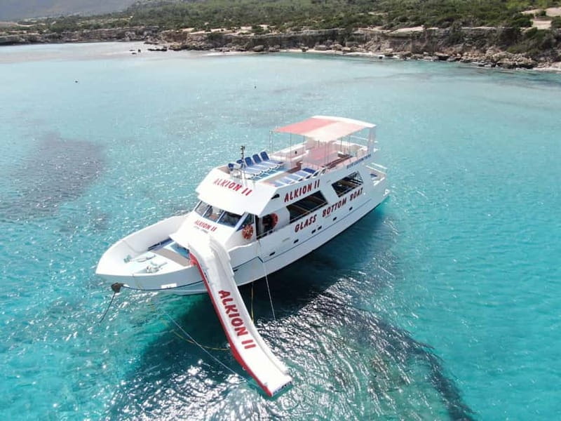 Latchi: Blue Lagoon Glass Bottom Boat Cruise with Drinks - Baths of Aphrodite, Saint George’s Island, and the story behind the coastline