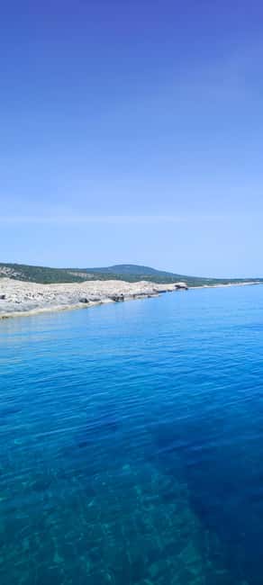 Pafos,Blue Lagoon,Latchi,day trip, coach boat+waterslide. - Blue Lagoon swim time, free fruit, and what to expect in the water
