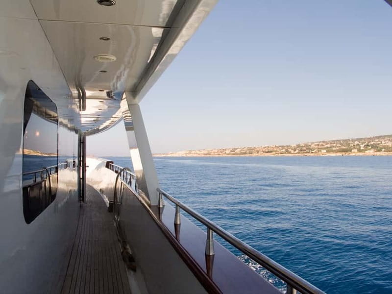 Paphos: Adults Only Cruise with Drinks, Food, Bus, Swim Stop - Champagne, Unlimited Local Drinks, and the Onboard Food Plan