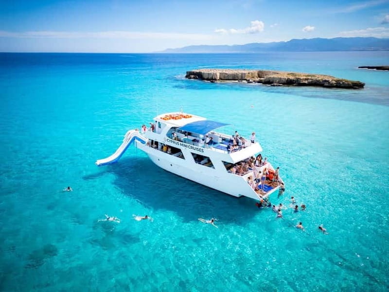 Paphos/Akamas: Blue Lagoon Bus & Boat Tour with Water Slide - Key highlights to know before you go