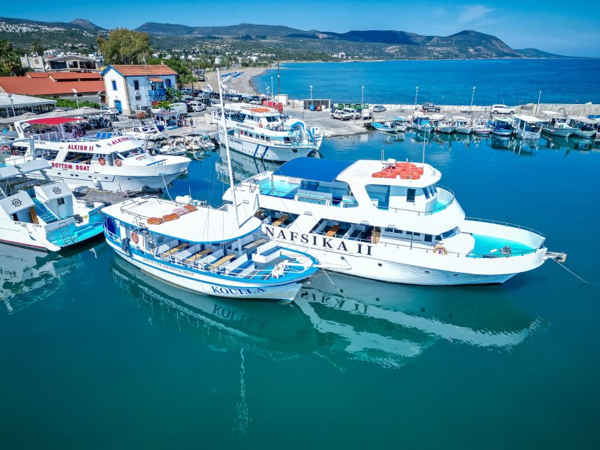 Paphos/Akamas: Blue Lagoon Bus & Boat Tour with Water Slide - Aphrodite’s Baths and sea caves: myth meets real sea views