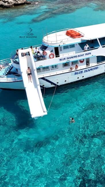 Paphos Blue Lagoon Cruise: Slide, Music & Hotel Transfer - From pickup to Latchi Harbour, what the first hour feels like