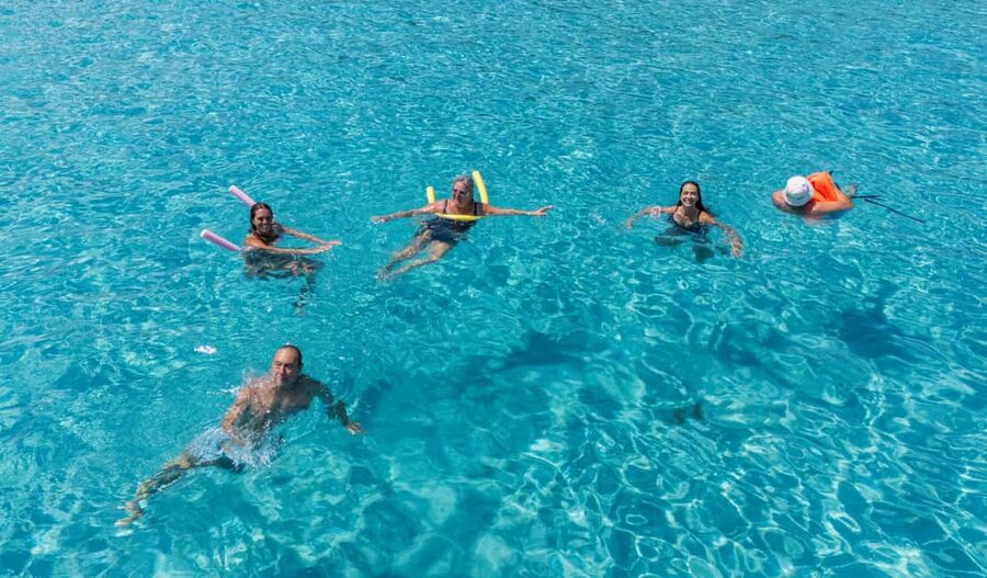 Paphos Blue Lagoon Cruise: Slide, Music & Hotel Transfer - Blue Lagoon time, the slide, and how to set yourself up for fun
