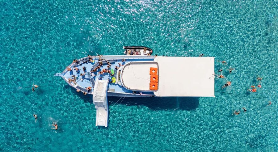 Paphos Blue Lagoon Cruise: Slide, Music & Hotel Transfer - The 3-hour Akamas Peninsula cruise and the famous passes