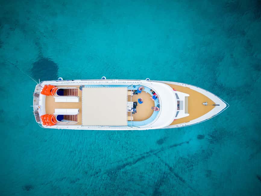 Paphos: Blue Lagoon Half Day Boat Trip with Hotel Transfer - Latchi Boarding and the Onboard Setup