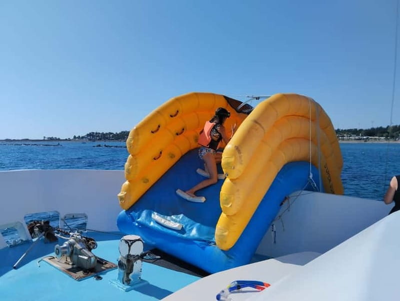 Paphos: Glass Bottom Boat Trip with Swimming or Snorkeling - Slide, Jump Platform, and Why the Short Trip Feels Different