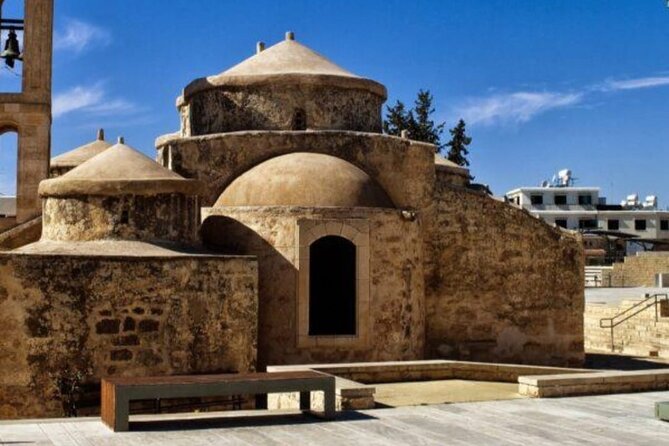 Paphos Half Day Tour Bus Pick Up from Hotels - Stop 1 in Paphos: The Guided Context Moment