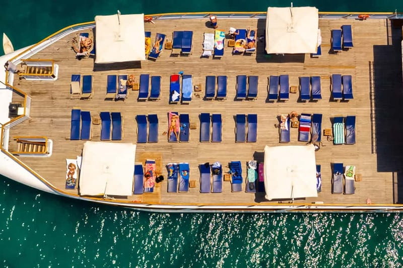 Paphos: Wave Dancer Half-Day Cruise with BBQ and Open Bar - Cruising toward Coral Bay: views, drinks, and the changing vibe