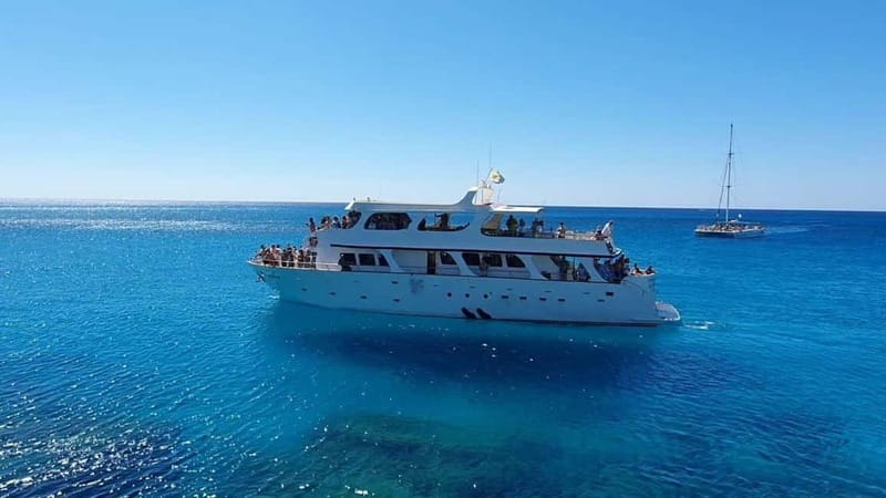 Protaras: 80s and 90s Sunset Cruise with Cypriot Dinner & DJ - Green Bay Stop: Swimming, Snorkeling Gear, and the Cypriot Dinner