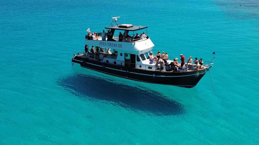 Protaras: Luxury Blue Lagoon Cruises 4H/Food/1 Drink/3 Swims - Fig Tree Bay photo time and Ayioi Anargiroi Church views