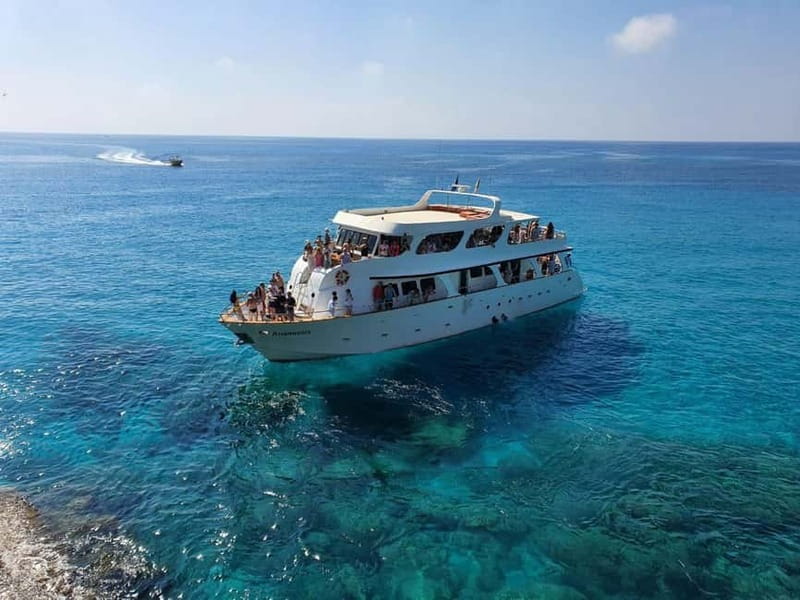 Protaras: Luxury Yacht Cruise with slide, BBQ Lunch & Drink - Varosha and the Cyprus divide, explained without getting heavy