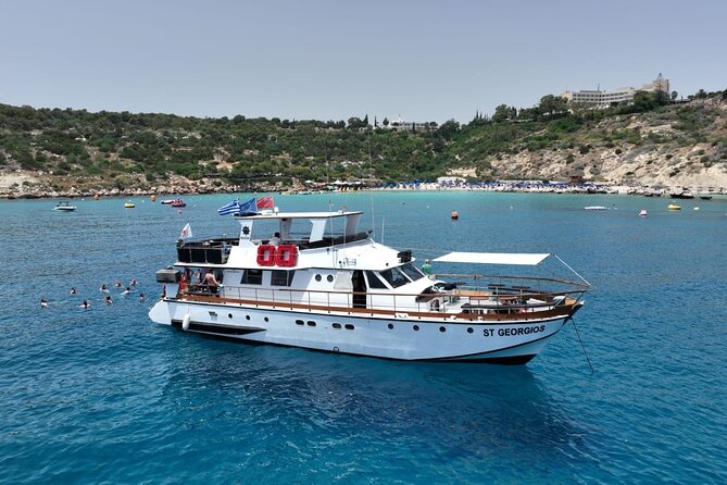 Protaras: Waterworld Value Cruise. 3 Swim Stops & slide! - Blue Lagoon swim stop, Shark Mouth cave, and Lovers Bridge