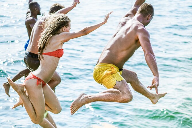 Wave Dancer Half Day BBQ Cruise - All Inclusive - The swim stop: calm-water time with gear that helps you feel confident