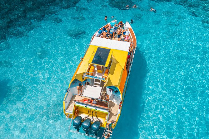 Yellow Boat Cruises: Afternoon Family Blue Lagoon & Turtle Cruise - Konnos Bay: turquoise water, golden sand, and quick pauses