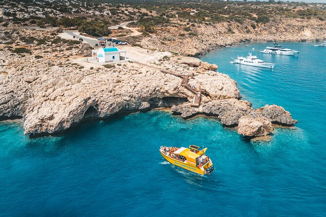 Yellow Boat Cruises: Afternoon Family Blue Lagoon & Turtle Cruise - Ayioi Anargiroi Church and the sea caves below