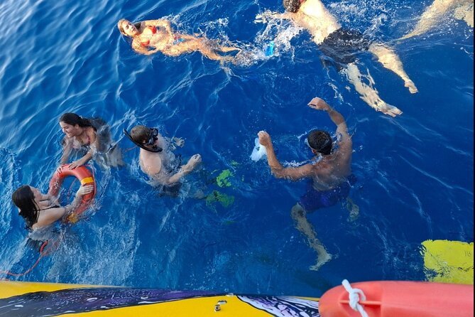 Yellow Submarine Swimming Cruise with Unlimited Drinks - Mackenzie Beach Swim: The Clear Water Break You Need
